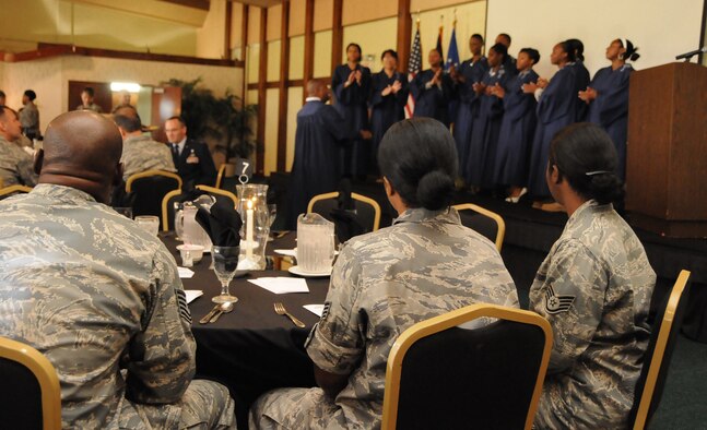 ANDERSEN AIR FORCE BASE, Guam - Guests of the Dr. Martin Luther King Jr. Remembrance Breakfast enjoy some gospel music by the IGS Gospel Choir, directed by retired Senior Master Sgt. Michael Williams here Jan. 15. Capt. Robert Lee III wrapped up the breakfast by giving a few words on Dr. Martin Luther King Jr. (U.S. Air Force photo by Airman 1st Class Courtney Witt)