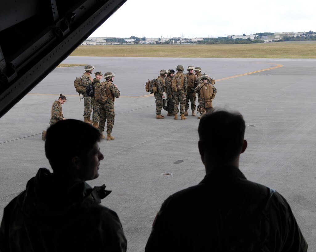 KADENA AIR BASE, Japan -- Staff Sgt. Steve Pressler, a 1st Special Operations Squadron loadmaster, discusses flight plans with Maj. John Rensel, a 1st SOS pilot and the mission commander, in the back of a MC-130H Combat Talon II. The 1st SOS conducted a training mission with Marines from the 31st Marine Expeditionary Unit Detachment 18 at Ie Shima Island Jan. 14. Crews from the 1st SOS constantly train with U.S. and allied forces to hone their capabilities to infiltrate, exfiltrate and resupply forces in austere, denied or hostile territory. (U.S. Air Force photo by Tech. Sgt. Aaron Cram)