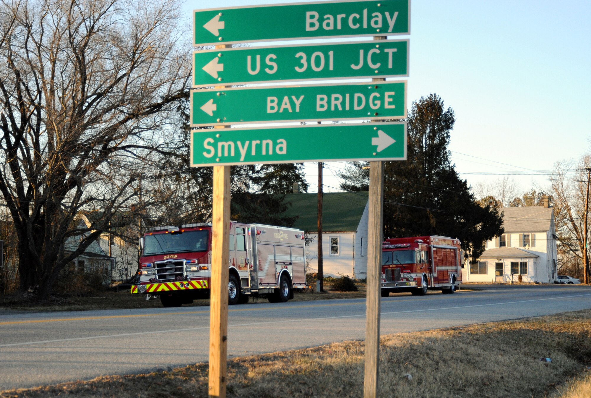 City of Dover firefighters wait near the Maryland-Delaware state line to escort Senior Airman Derek Larson, a 436th Civil Engineer Squadron and City of Dover volunteer firefighter, through downtown Dover to his home Jan. 16. Airman Larson returned from a deployment to Joint Base Balad, Iraq, where he served as a fire protection driver-operator with the 332nd Expeditionary Civil Engineer Squadron. (U.S. Air Force photo/Tech. Sgt. Kevin Wallace)