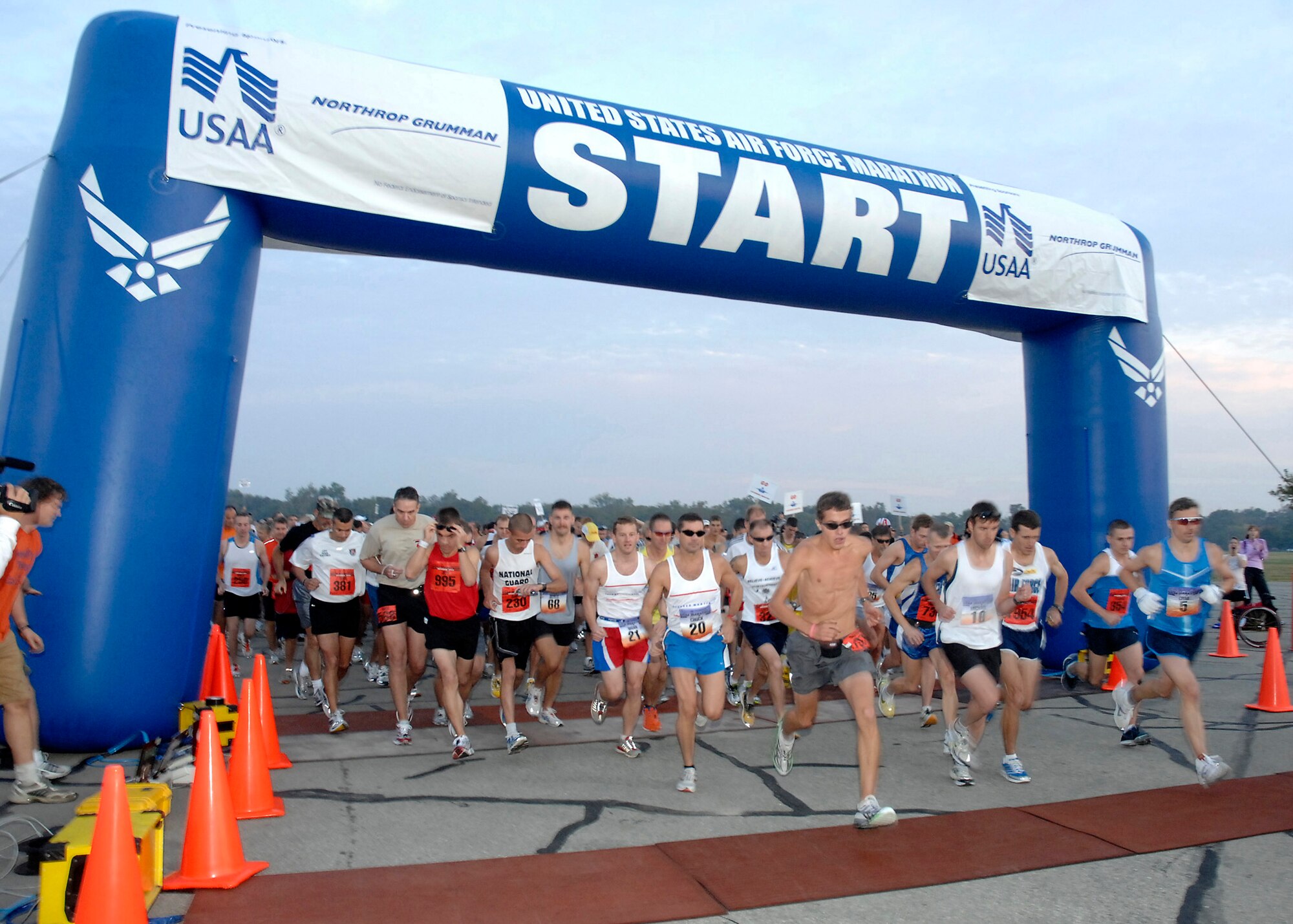 Runners scramble away from the starting line as the gun sounds to begin the 2008 United States Air Force Marathon.  Held Sept. 20, 2008 at Wright-Patterson Air Force Base, Ohio, the 12th annual event featured nearly 7400 entrants and was run on an expanded course so as to include several communities surrounding the base.  (U.S. Air Force photo/Al Bright)
