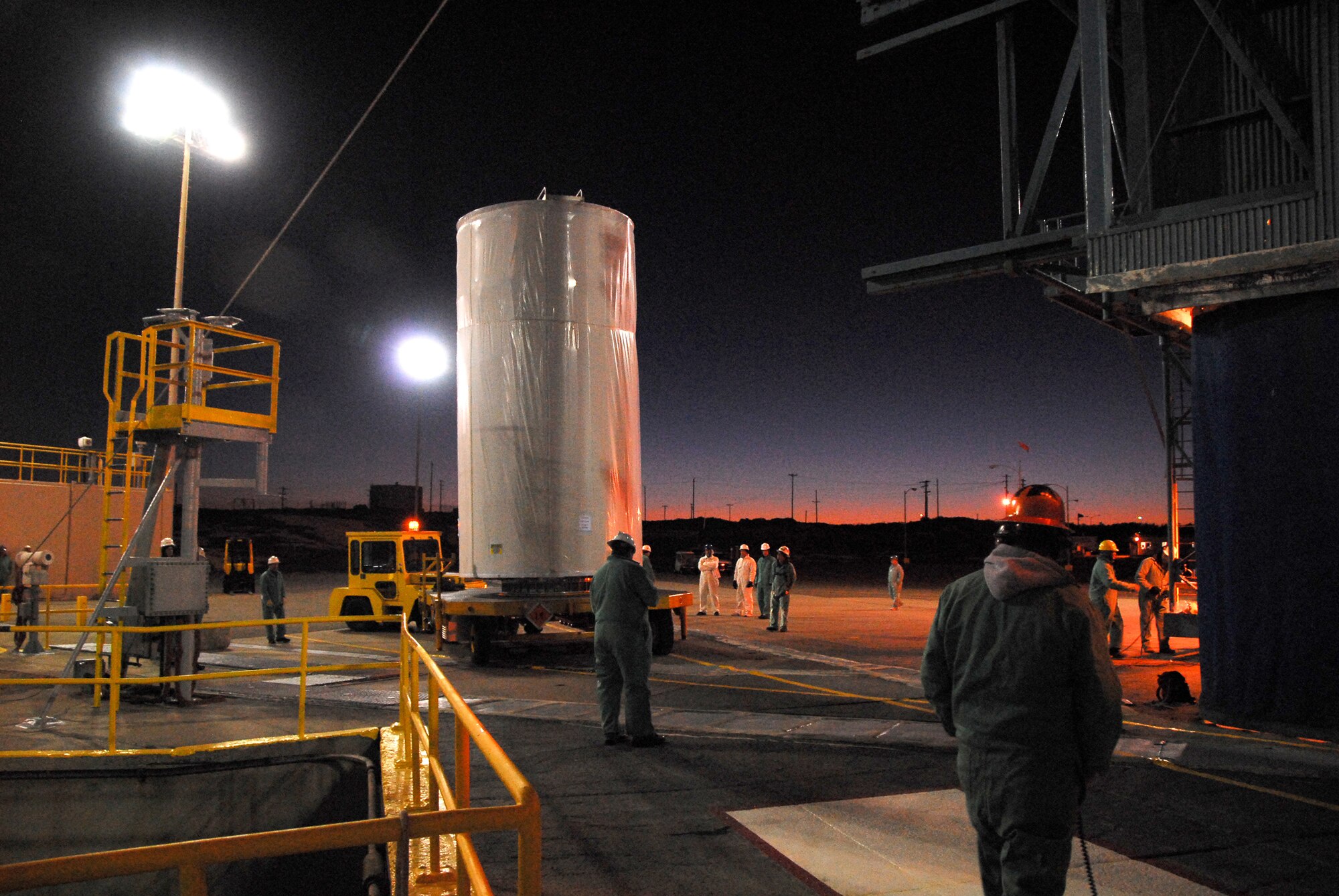 VANDENBERG AIR FORCE BASE, Calif. --  A "canned" National Oceanic and Atmospheric Administration weather satellite is put into position for lift and mate to Vanednberg's Delta II rocket. The rocket is scheduled to launch Feb. 4. (U.S. Air Force photo/Mark P. Mackley)