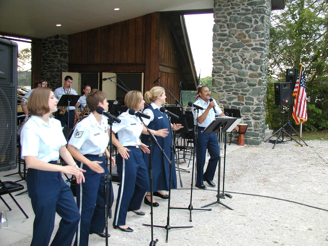 Members of the ANG Band of the Mid-Atlantic prepare for a performance at Codorus State Park near Hanover, Pennsylvania. (U.S. Air Force photo by SSgt Timothy Ross)