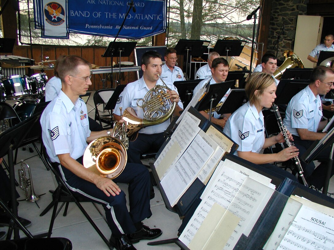 Members of the ANG Band of the Mid-Atlantic prepare for a performance at Codorus State Park near Hanover, Pennsylvania. (U.S. Air Force photo by SSgt Timothy Ross)