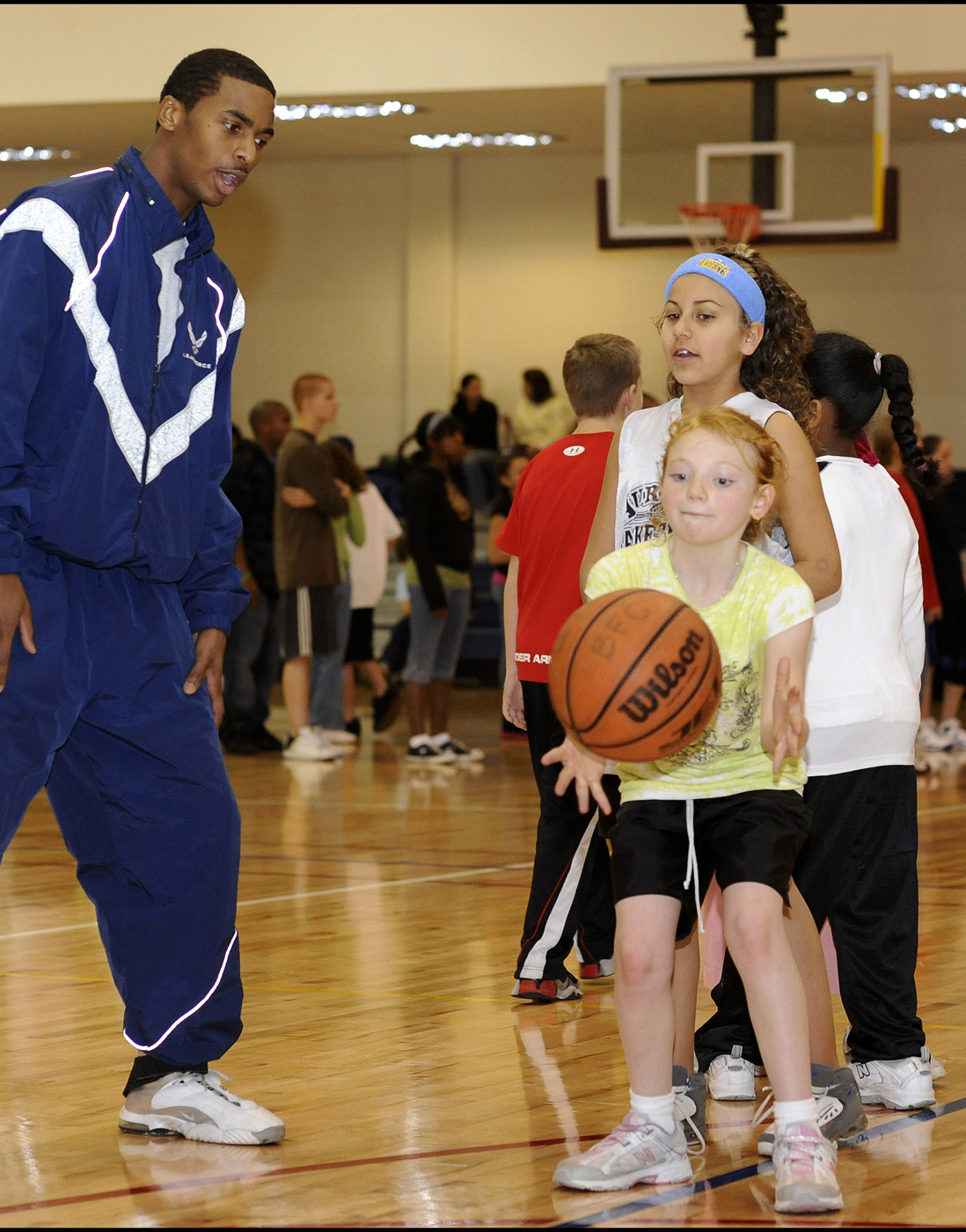 Larger than life -- Shaq shares hoops clinic with Buckley's children > Air  Force Space Command (Archived) > Article Display