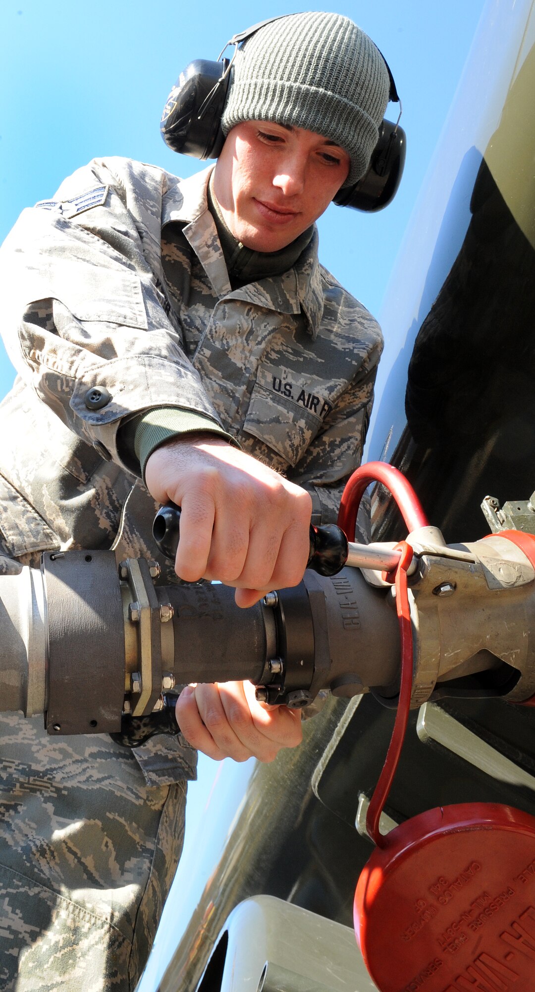 LANGLEY AIR FORCE BASE, Va. -- Senior Airman Nathan Baxter, 1st Logistics Readiness Squadron fuels distribution operator, fills his fuel truck Jan. 16. The 1st LRS recently won the 2008 Air Combat Command Maj. Gen. Warren R. Carter Logistics Effectiveness Award, also known as the Daedalian Award.  (U.S. Air Force photo/Airman 1st Class Zachary Wolf) (U.S. Air Force photo/Airman 1st Class Zachary Wolf)