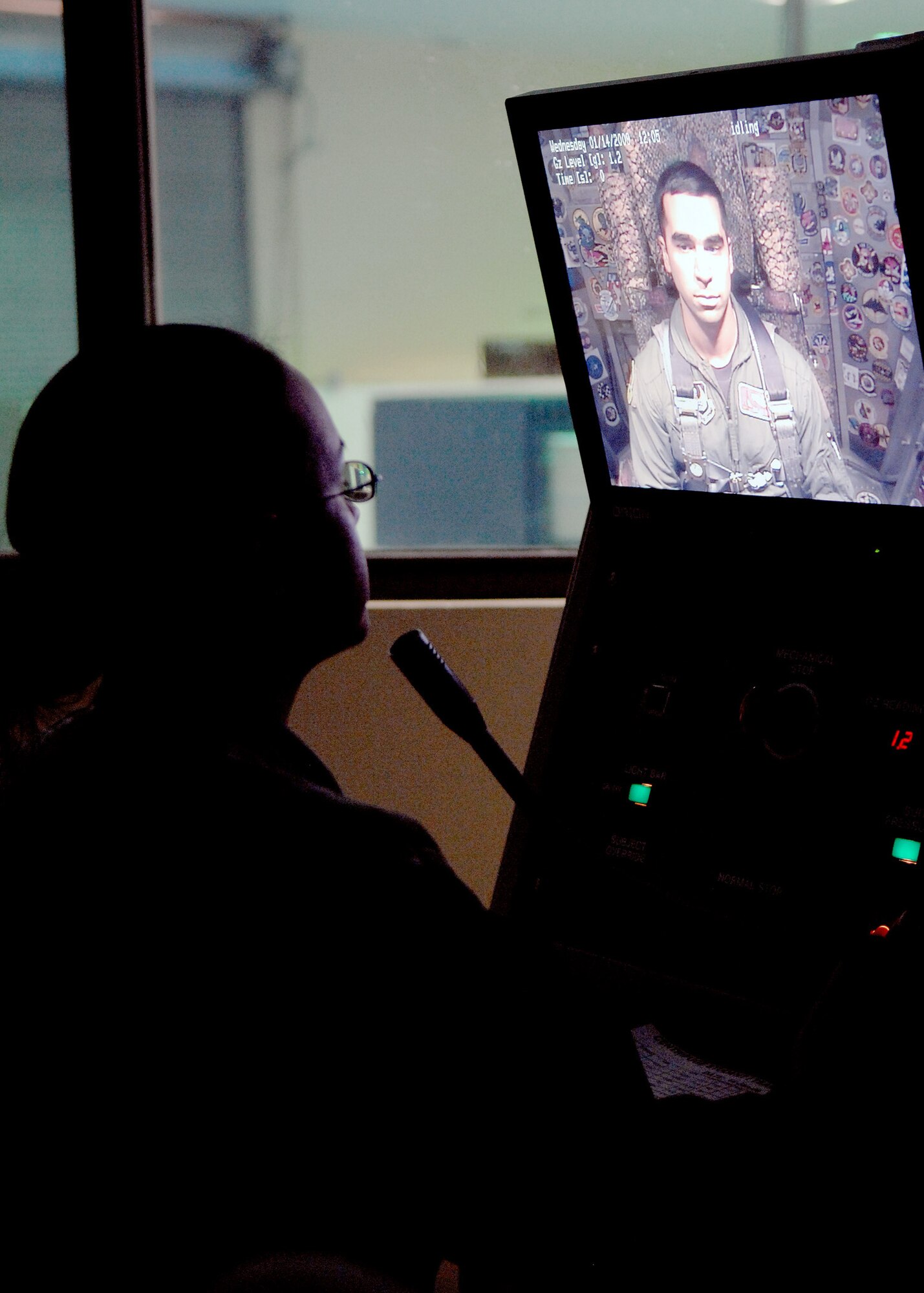 Maj. Raja Chari, listens to his voice guided instructor, Senior Airman Guadalupe Young, during the human centrifuge, Jan. 14, at Holloman Air Force Base, N.M. Major Chari is assigned to the 40th Flight Test Squadron, 46th Test Wing, Air Force Material Command. Major Chari was the 30,000 student to go through the course. (U.S. Air Force photo/ Senior Airman Anthony Nelson)
