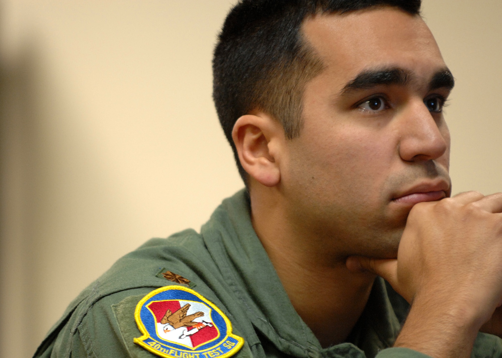 Maj. Raja Chari listens to instructor 2nd Lt. Shawnalee Bradley as she explains the protocol before getting into the human centrifuge, Jan. 14, at Holloman Air Force Base, N.M. Maj. Chari is assigned to the 40th Flight Test Squadron, 46th Test Wing, Air Force Material Command. He was the 30,000 student to go through the course. (U.S. Air Force photo/ Senior Airman Anthony Nelson)
