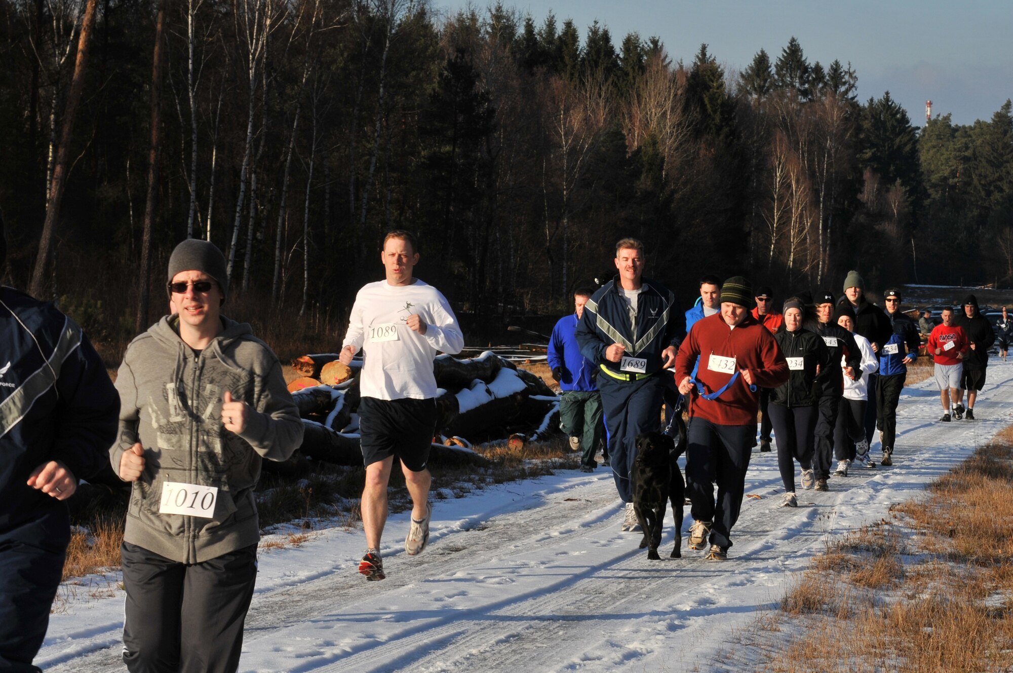 Runners participate in the Penguin Prediction Run Jan. 15, 2009, on the 86th Construction and Training Squadron compound at Ramstein Air Base. The run, which is to be an annual event, was held to promote fitness and increase awareness of the challenges facing abandoned women and children in Pristina, Kosovo. (U.S. Air Force photo by Senior Airman Nathan Lipscomb)