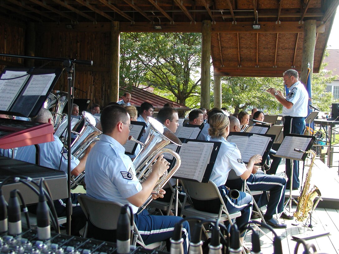 Members of the ANG Band of the Mid-Atlantic warm up for a performance at Codorus State Park near Hanover, Pennsylvania.  (U.S. Air Force photo by SSgt Timothy Ross)