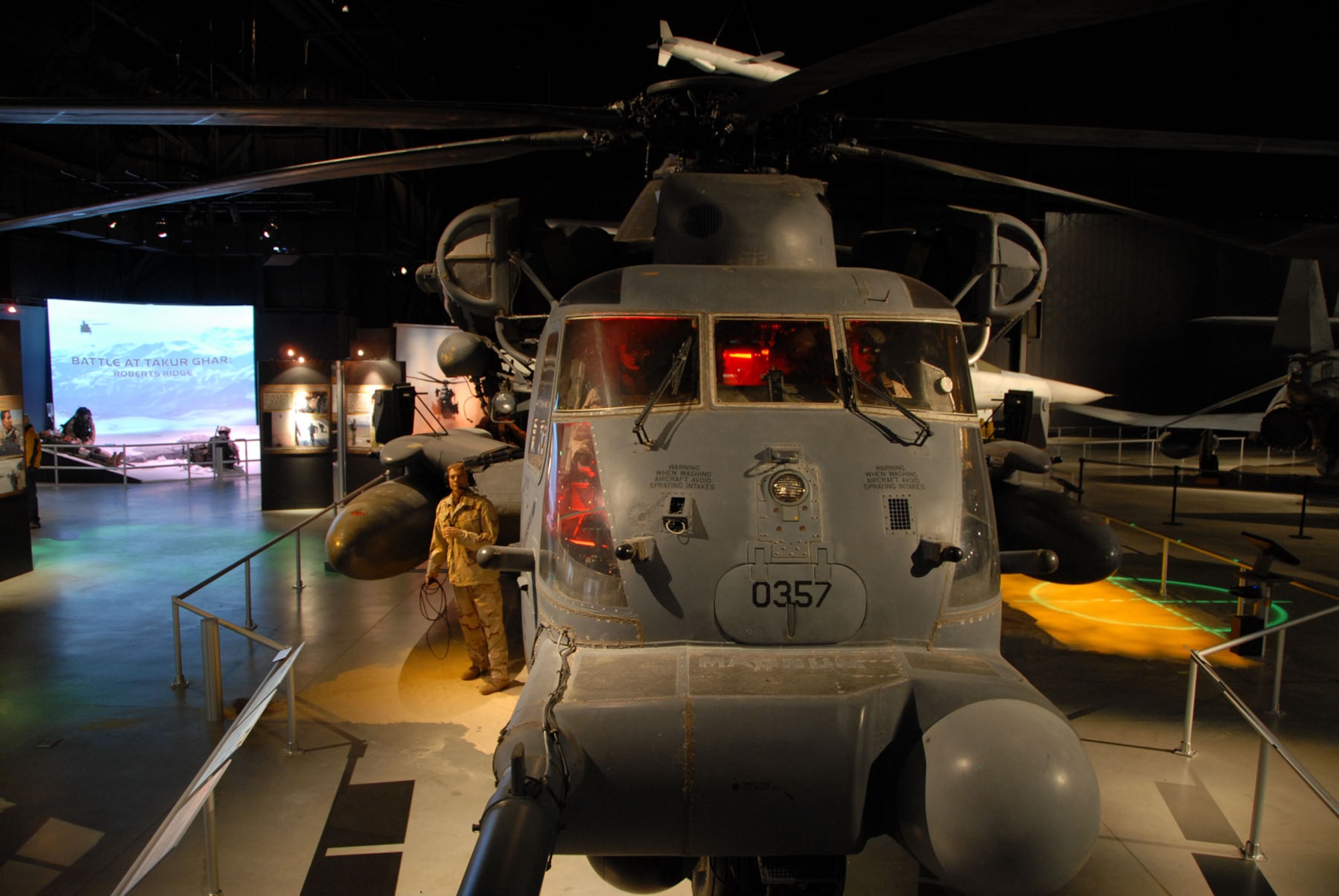 DAYTON, Ohio - The Warrior Airmen exhibit, including the MH-53, on display in the Cold War Gallery at the National Museum of the U.S. Air Force. (U.S. Air Force photo)