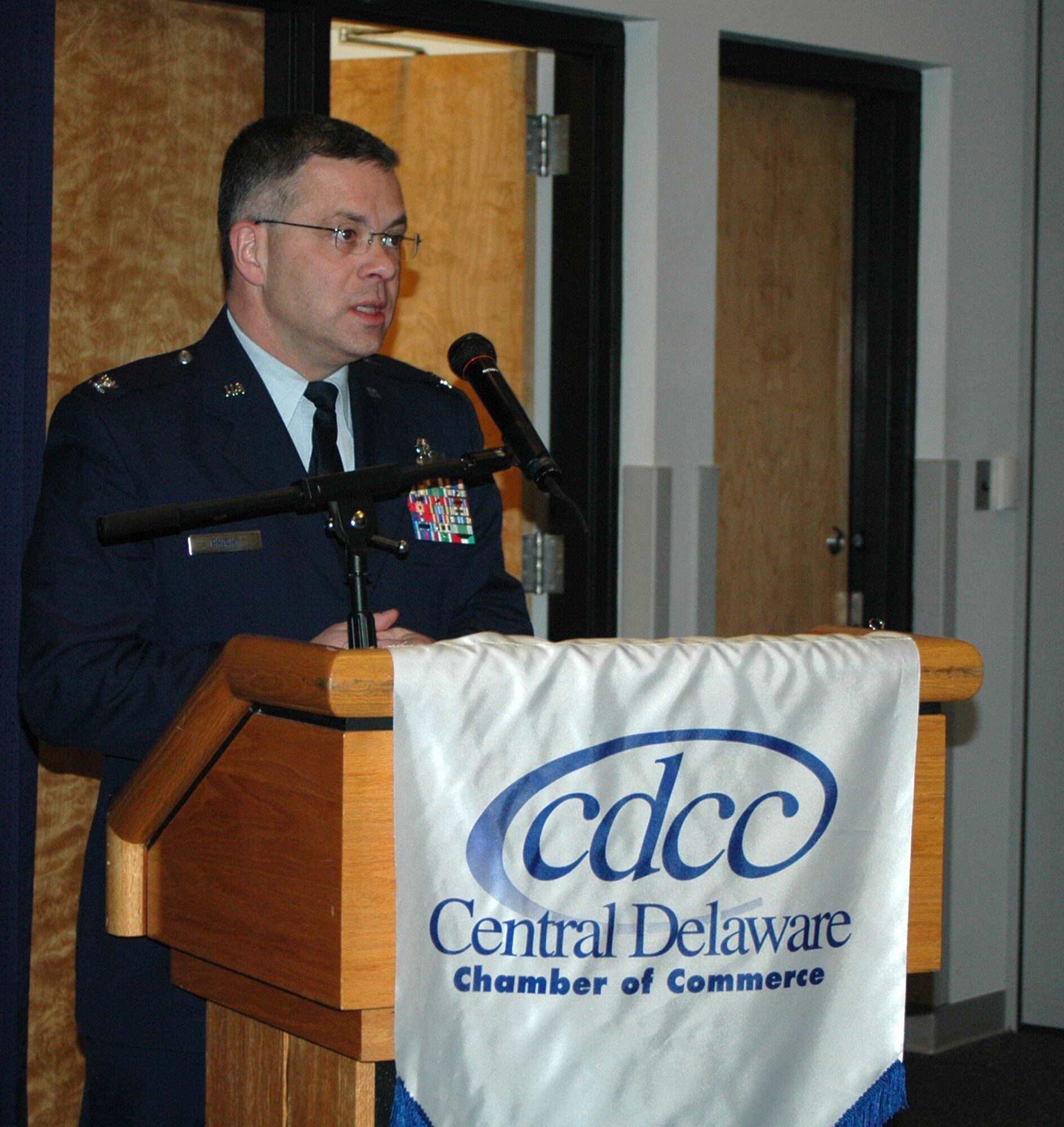 DOVER AIR FORCE BASE, Del. -- Col. Randal L. Bright, 512th Airlift Wing commander,addresses base and community members at the Military Affaire held at the Landings here Jan. 15. The annual mixer was sponsored by the Central Delaware Chamber of Commerce. (U.S. Air Force photo/Capt. Marnee A.C. Losurdo).