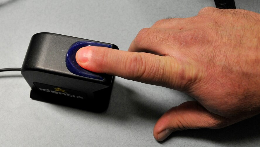 MISAWA AIR BASE, Japan -- Brian Branstetter, 35th Maintenance Group, scans in his fingerprint for the Defense Biometric Identification System Jan. 16, 2009.  The $260,000 is currently in use in the Pacific at U.S. Armed Forces Korea and Yokota Air Base, Japan (U.S. Air Force photo by Senior Airman Chad Strohmeyer)