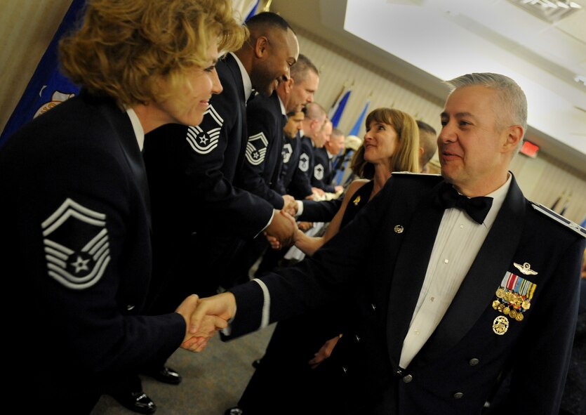 MOODY AIR FORCE BASE, Ga. -- Col. Kenneth Todorov, 23rd Wing commander, congratulates Senior Master Sgt. Dianna Vallely, 23rd Medical Operations Squadron superintendent, on her selection for promotion to the rank of chief master sergeant after the Chief Recognition Ceremony here Jan. 17. Eight members of Moody were selected for promotion. (U.S. Air Force photo by Senior Airman Gina Chiaverotti)