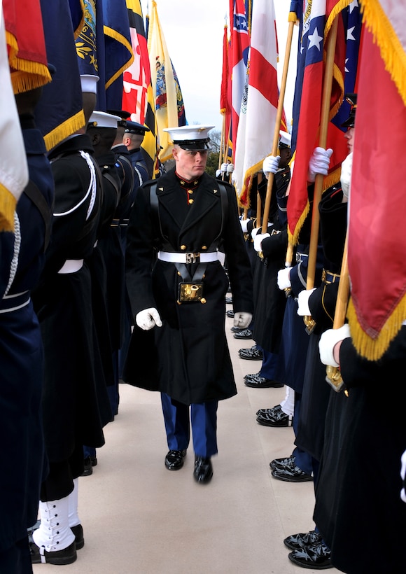 U.S. Marine Lance Cpl. Stuart Wadsworth inspects the Joint Ceremonial Honor Guard before their performance at the Lincoln Memorial during the inaugural opening ceremonies on the National Mall in Washington, D.C., Jan. 18, 2009.  More than 5,000 men and women in uniform are providing military ceremonial support to the presidential inauguration, a tradition dating back to George Washington's 1789 inauguration.