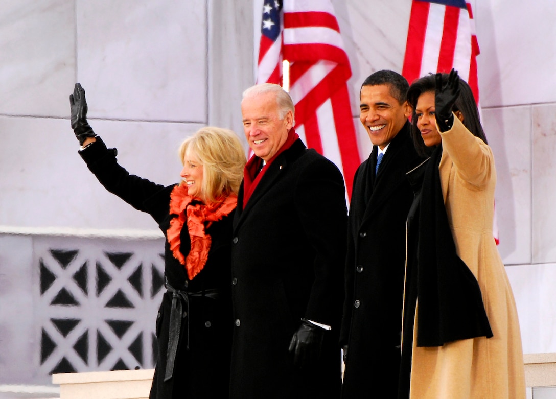 Jill Biden, Vice President-elect Joe Biden, President-elect Barack Obama, and Michelle Obama wave to the crowd gathered at the Lincoln Memorial during inaugural opening ceremonies on the National Mall in Washington, D.C., Jan. 18, 2009.