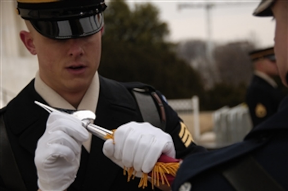 The U.S. Army Ceremonial Honor Guard prepares to perform at the Lincoln Memorial on the National Mall in Washington, D.C., Jan. 18, 2009, during the inaugural opening ceremonies. More than 5,000 men and women in uniform are providing military ceremonial support to the presidential inauguration, a tradition dating back to George Washington's 1789 inauguration.