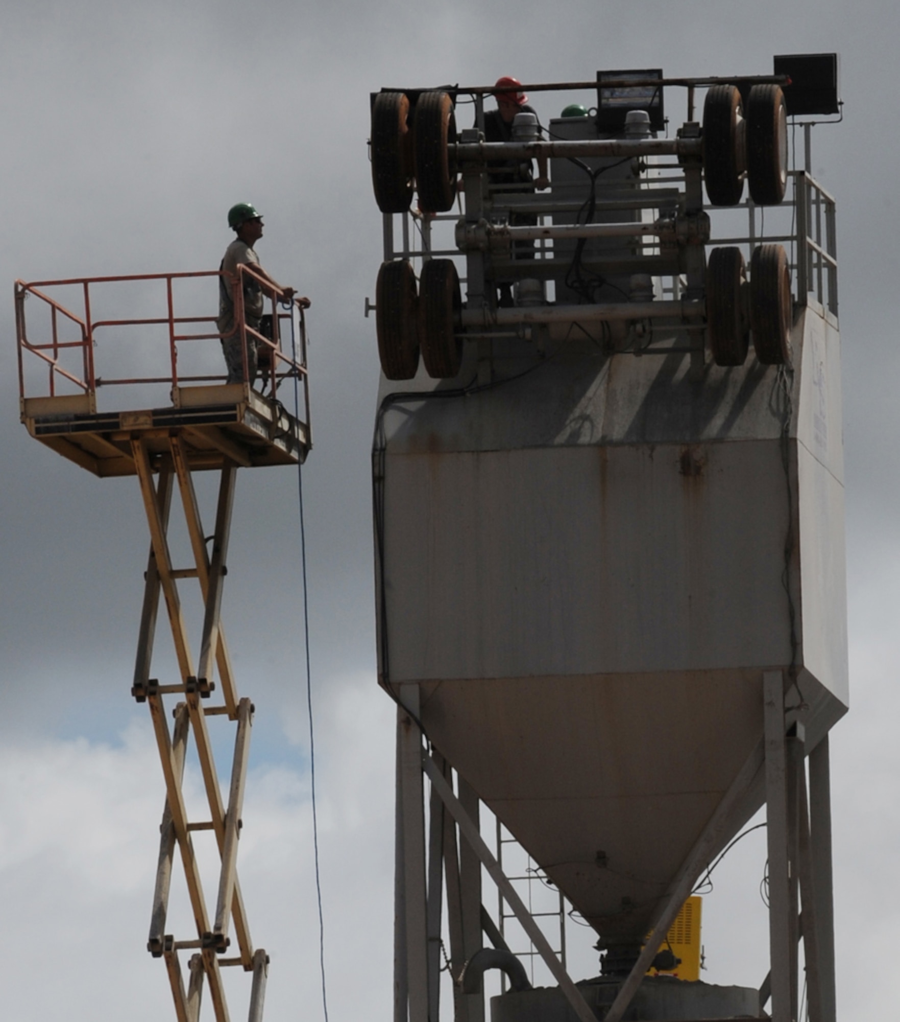 Airman from the 554th Red Horse Squadron prepare to pour concrete Jan.13 at Northwest field, Andersen Air Force Base, Guam. Once complete the site will be PACAF's future, premier Expeditionary Combat Skills Training Campus providing 80 facilities and infrastructure supporting four units: 554th and 254th RED HORSE Squadrons, Commando Warrior, 644th Combat Communications and 554th Silver Flag onto one base. Rapid Engineer Deployable Heavy Operations Repair Squadron Engineer (RED HORSE) provide the Air Force with a highly mobile civil engineer response force to support contingency and special operations worldwide. There are seven active-duty, Air Force Reserve Command, and Air National Guard RED HORSE squadrons. 
(U.S. Air Force photo/ Master Sgt. Kevin J. Gruenwald) released


