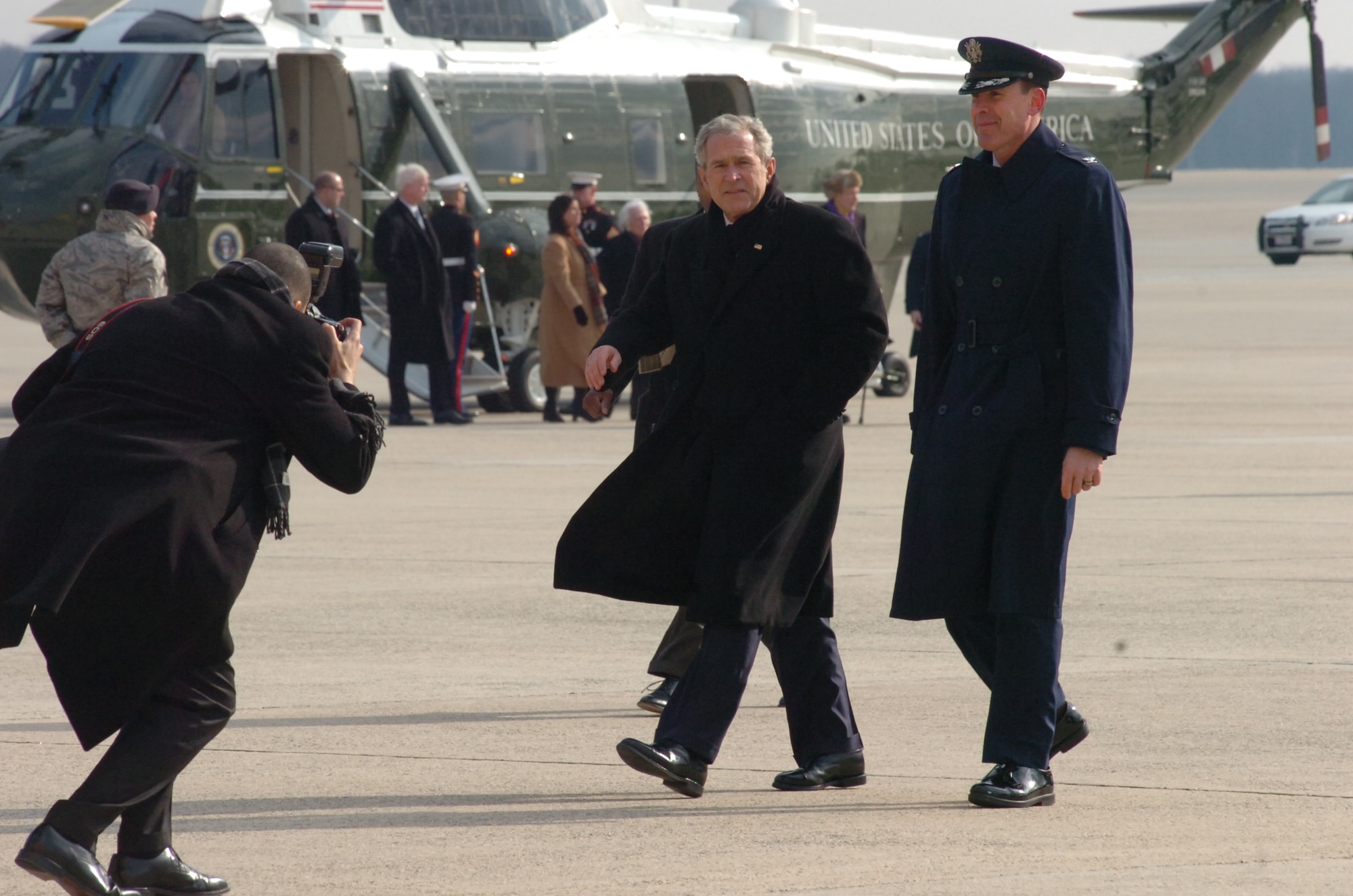 Former President George W. Bush walks with Col. Steven M. Shepro prior to delivering his final goodbyes to more than 1,000 guests Jan. 20 at Andrews Air Force Base, Md. Colonel Shepro is the 316th Wing commander. (U.S. Air Force photo/Bobby Jones) 