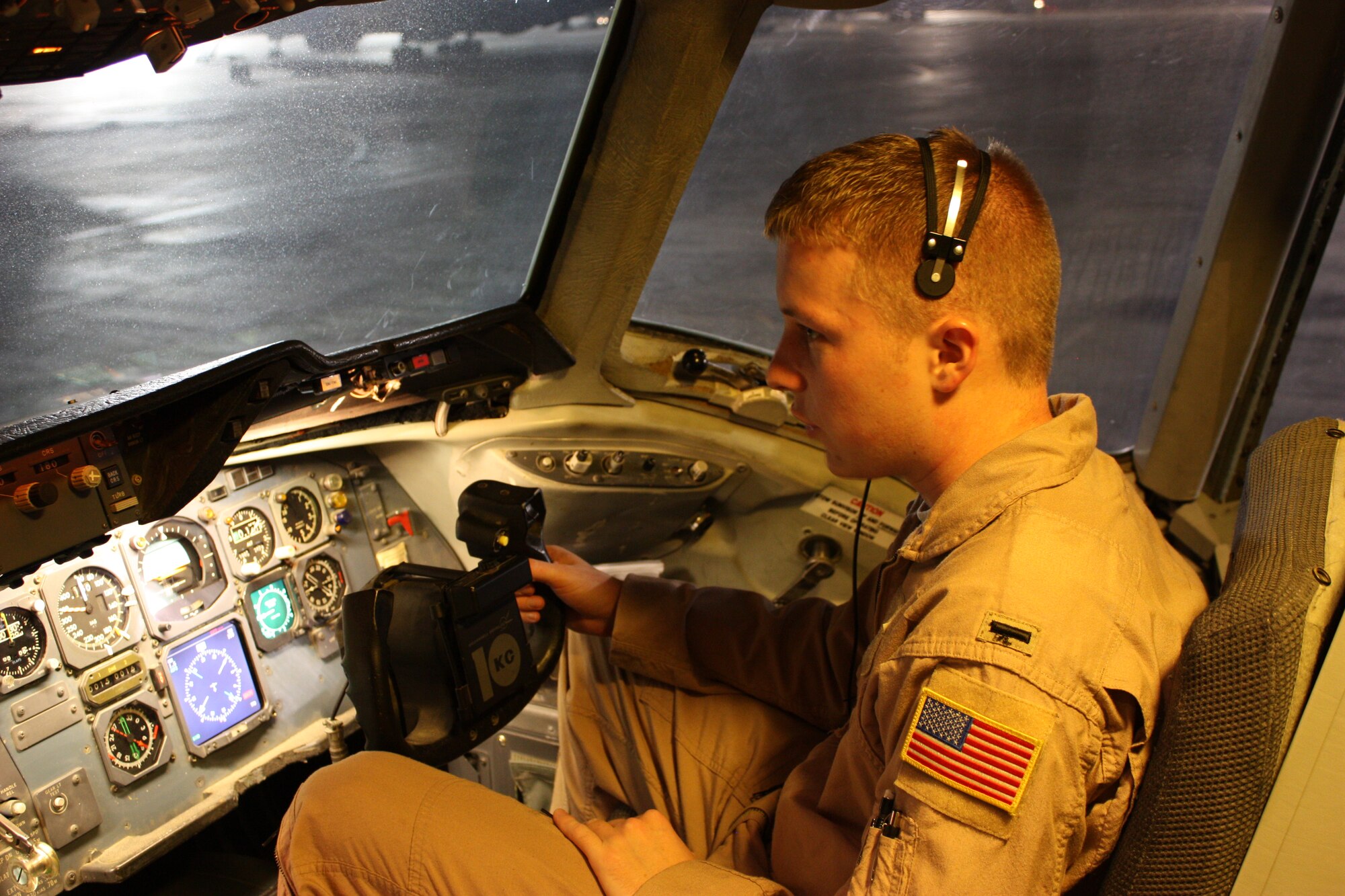 1st Lt. Chris Smorol, 2nd Air Refueling Squadron KC-10 pilot, communicates with air traffic control prior to a mission while deployed in 2008. The 2nd ARS directly supports Operations Iraqi Freedom and Enduring Freedom; during recent missions, KC-10s and the 2nd ARS played a large role in providing fuel to aircraft protecting ground assets while building the Kajaki Dam in Afghanistan. (U.S. Air Force courtesy photo)