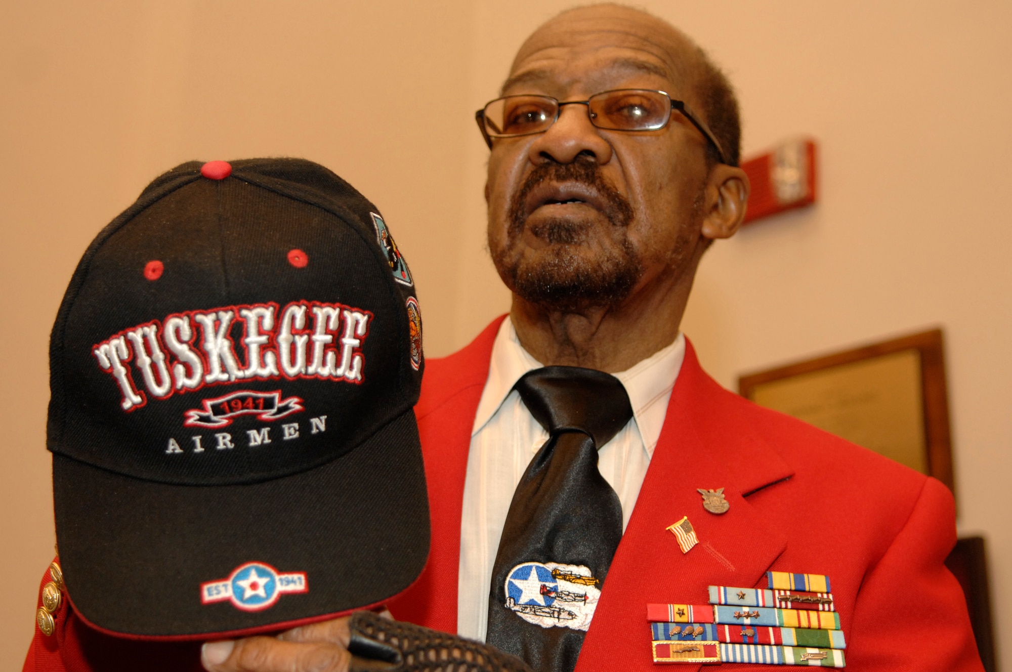 Norman Artis, Tuskegee Airman, shows off his hat Jan. 20 at the Bolling Club.  More than 180 Tuskegee Airmen and their families gathered for a breakfast  and security clearing at the Bolling Club, before being bused downtown for the 2009 inaugural events. (U.S. Air Force photo by Senior Airman Tim Chacon)