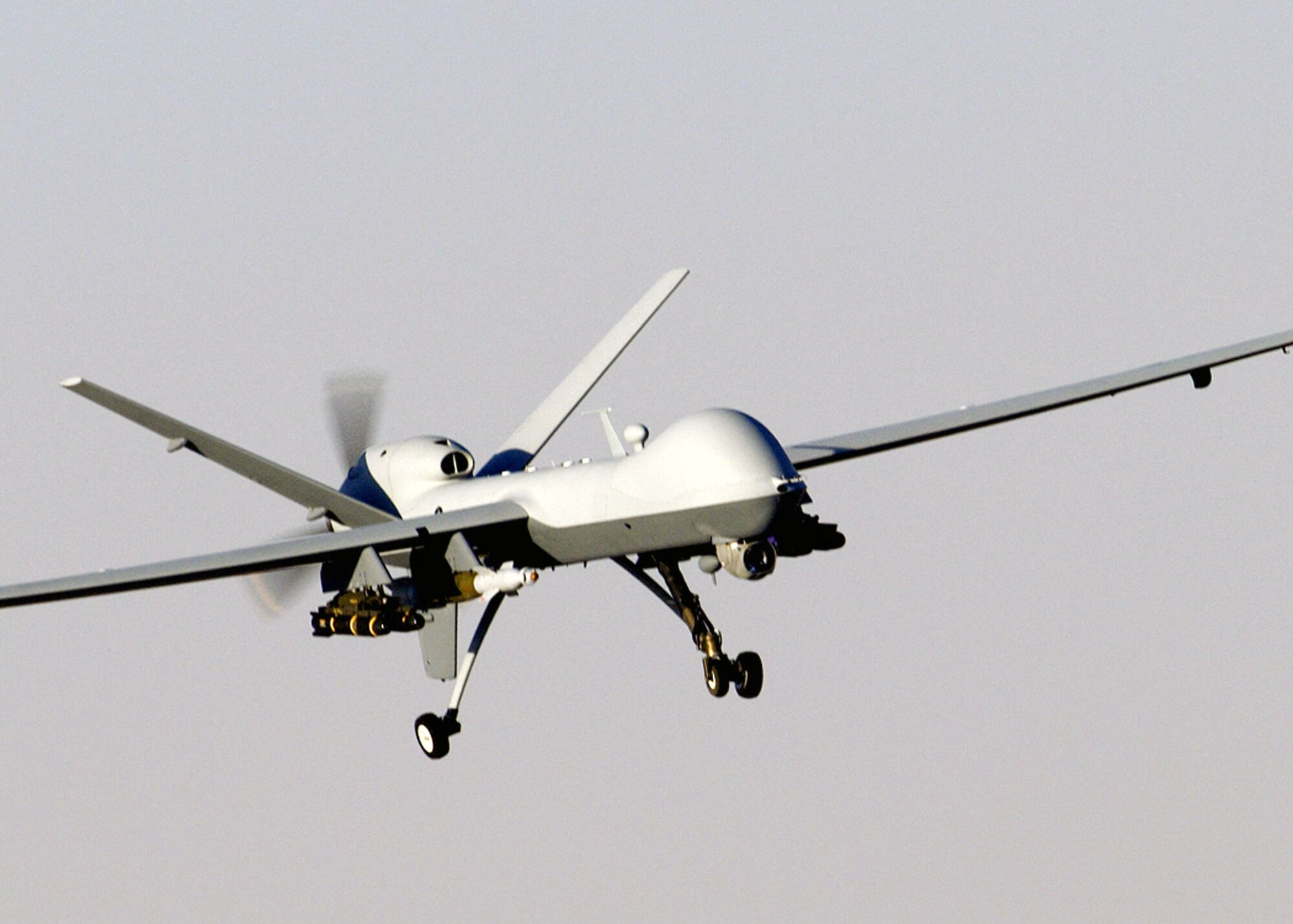 An MQ-9 Reaper unmanned aircraft prepares to land after a mission in support of Operation Enduring Freedom in Afghanistan. The Reaper has the ability to carry both precision-guided bombs and air-to-ground missiles. (U.S. Air Force photo/Staff Sgt. Brian Ferguson)