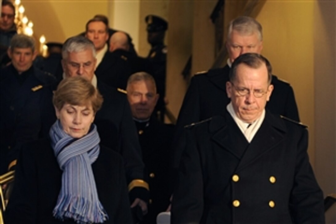 Navy Adm. Mike Mullen, right, chairman of the Joint Chiefs of Staff, arrives at the U.S. Capitol before the start of the 56th Presidential Inauguration in Washington, D.C., Jan. 20, 2009. More than 5,000 men and women in uniform are providing military ceremonial support to the presidential inauguration, a tradition dating back to George Washington's 1789 inauguration.