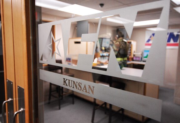 Staff Sgt. Aaron Drobnack, American Forces Network Kunsan, talks to the Wolf Pack on AFN The Eagle during the Peninsula-Wide Operational Readiness Exercise Beverly Bulldog 09-01 at Kunsan Air Base, Republic of Korea. AFN brodacasters normally host a morning radio show Monday through Friday, however when the base conducts an exercise the staff members broadcast 24 hours a day. (U.S. Air Force Photo by Senior Airman Gustavo Gonzalez)  