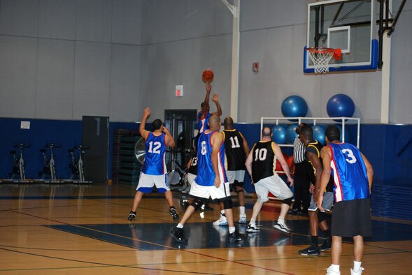 TAKING A SHOT: J.R. Green, 452 SFS Team # 1, shoots a jumper during the big game against the Navy team at the 2008 Intramural Basketball Championship Game, Jan. 7, in the Fitness Center. The Navy beat 452 SFS #1, 57 to 46. (U.S. Air Force photo)