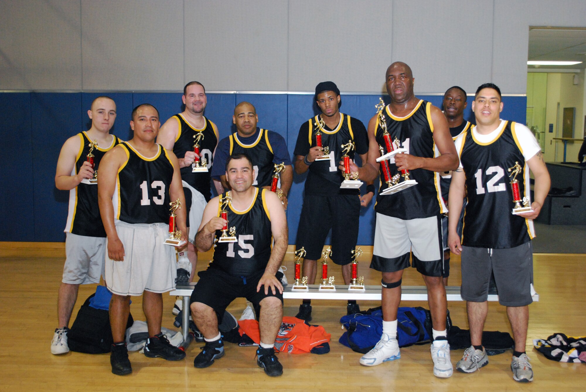 RUNNERS-UP: 2008 Basketball Championship runners-up, 452 SFS Team #1, show off their winnings after rising to take the second spot against Navy, Jan. 7. (U.S. Air Force photo)