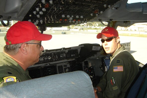 Pilots Lt. Col. Keith Guillotte and Capt. Seth Ewalt converse in the cockpit shortly after parking. (U.S Air Force photo by Will Alexander)
