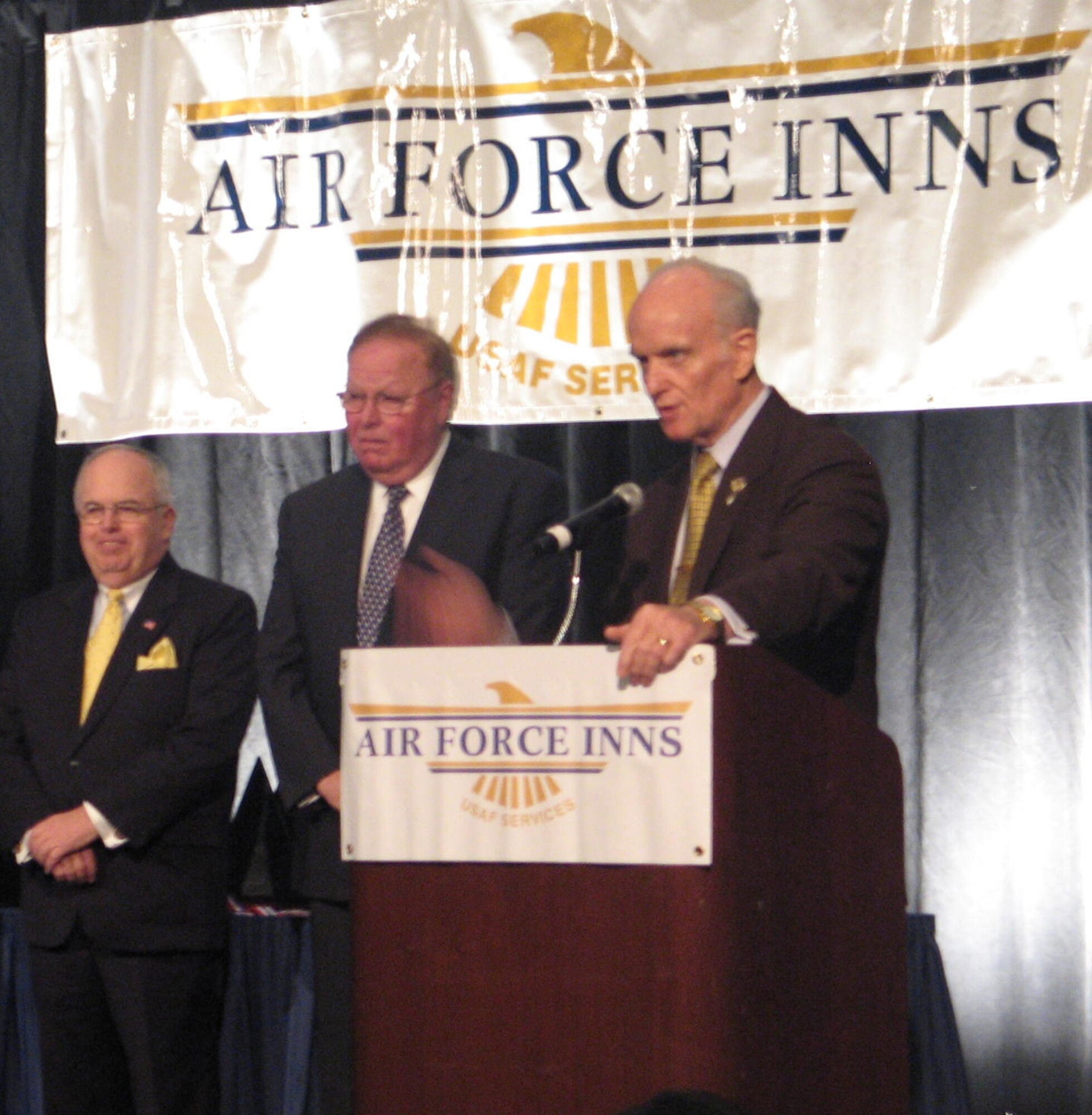 Art Myers, Air Force Services director, speaks at the annual Air Force Innkeeper Awards, November 2008, at the International Hotel/Motel Restaurant Show, New York City, NY, before presenting the Commander's Award for Public Service to Joseph McInerney and Joseph Spinnato. Mr. McInerney is president and chief executive officer of the American Hotel & Lodging Association and Mr. Spinnato is president and CEO of the Hotel Association of New York City, Inc. (Photo courtesy Military Club & Hospitality)
