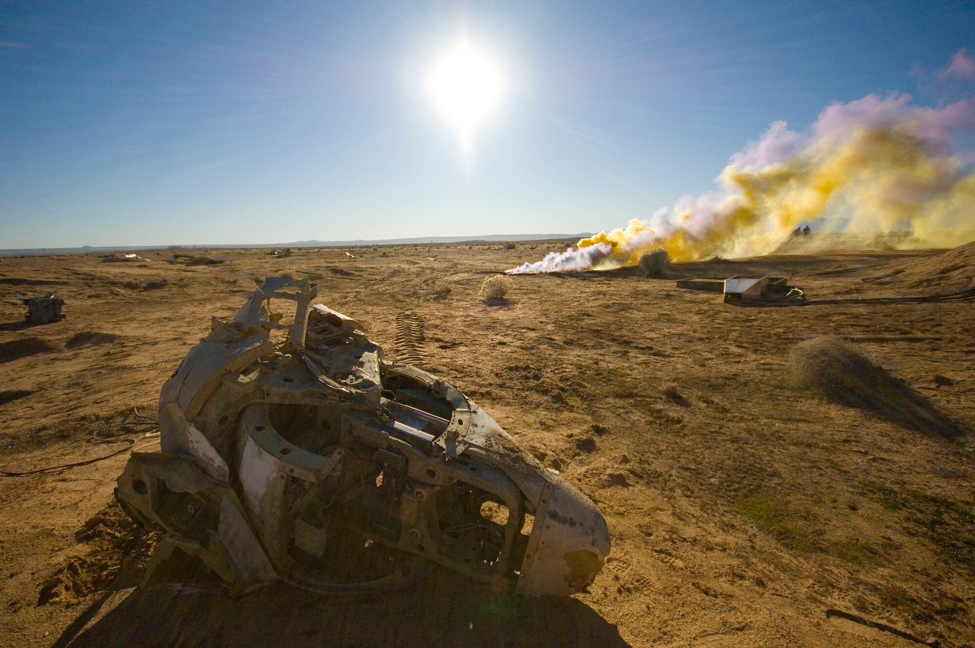 Debris from a simulated F-16 Fighting Falcon crash scatters across Camp Corum Jan. 12 during the base's Unit Compliance Inspection. The base received an overall UCI score of "Excellent" and a Logistics Standardization Evaluation Team inspection grade of "Satisfactory." (Air Force photo by Mike Cassidy)
