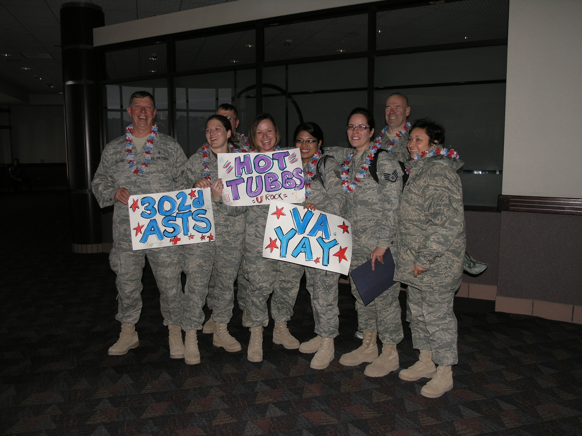 Aeromedical Staging Squadron members pose for a photo upon their return from serving a four-month tour of duty at Balad Air Base, Iraq. (U.S. Air Force photo/Tech. Sgt. David D. Morton) 