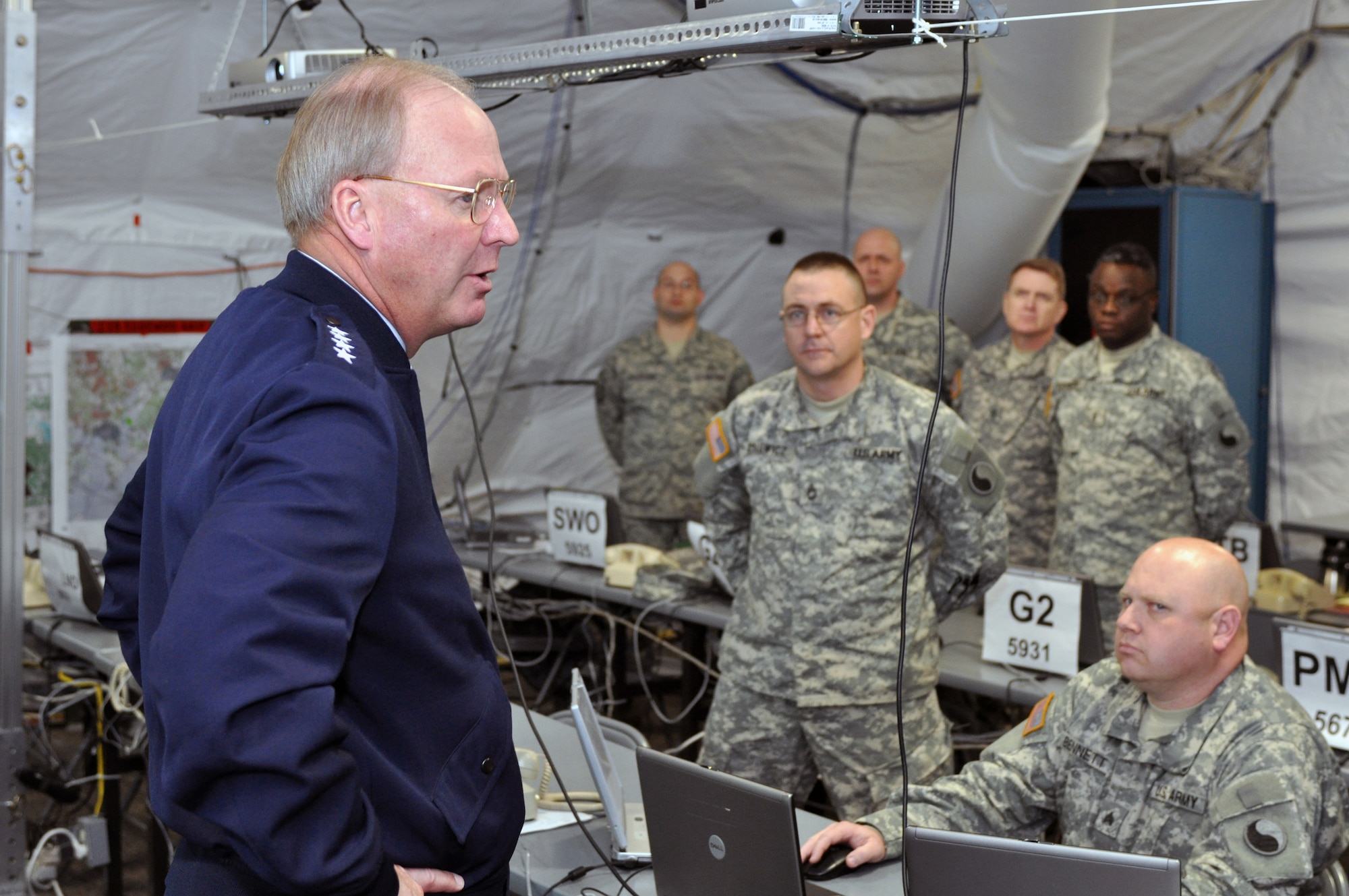 Gen. Craig McKinley, the chief of the National Guard Bureau, visits with National Guard Citizen-Soldiers of Joint Task Force 29 led by the 29th Infantry Division on Jan. 19, 2009, at a temporary operations center established at Fort Belvoir, Va., to coordinate some of the 9,300 National Guard Citizen-Soldiers and -Airmen who are supporting the 56th Presidential Inauguration. (U.S. Army photo by Staff Sgt. Jim Greenhill) (Released)