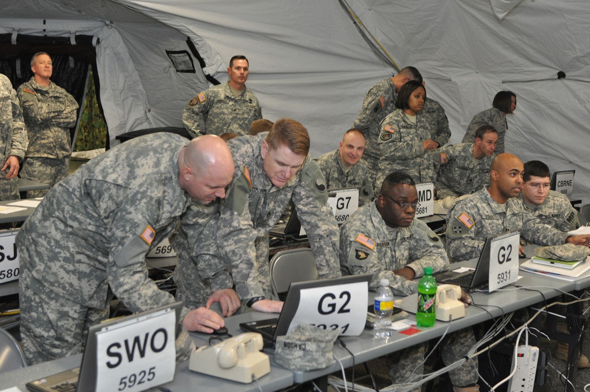 National Guard Citizen-Soldiers of Joint Task Force 29 led by the 29th Infantry Division coordinate activities of some of the 9,300 National Guard Citizen-Soldiers and -Airmen who are supporting the 56th Presidential Inauguration from a temporary operations center established at Fort Belvoir, Va., on Jan. 19, 2009. (U.S. Army photo by Staff Sgt. Jim Greenhill) (Released)