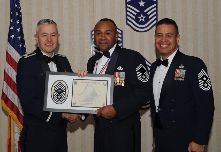 MOODY AIR FORCE BASE, Ga. -- Members recently selected for promotion to the rank of chief master sergeant pose for photos with Moody leadership and their family members during the Chief's Recognition Ceremony here Jan. 17. (U.S. Air Force photo by Senior Airman Gina Chiaverotti)