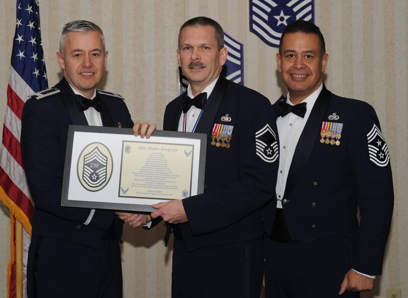 MOODY AIR FORCE BASE, Ga. -- Members recently selected for promotion to the rank of chief master sergeant pose for photos with Moody leadership and their family members during the Chief's Recognition Ceremony here Jan. 17. (U.S. Air Force photo by Senior Airman Gina Chiaverotti)
