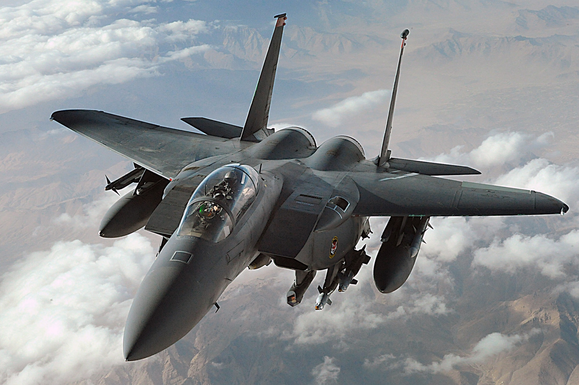 An F-15E Strike Eagle soars over Afghanistan providing close-air support and armed aerial overwatch to deter enemy activities. The Strike Eagle is from the 391st Expeditionary Fighter Squadron, Bagram Airfield, Afghanistan. (U.S. Air Force photo/Staff Sgt. Aaron Allmon)  
