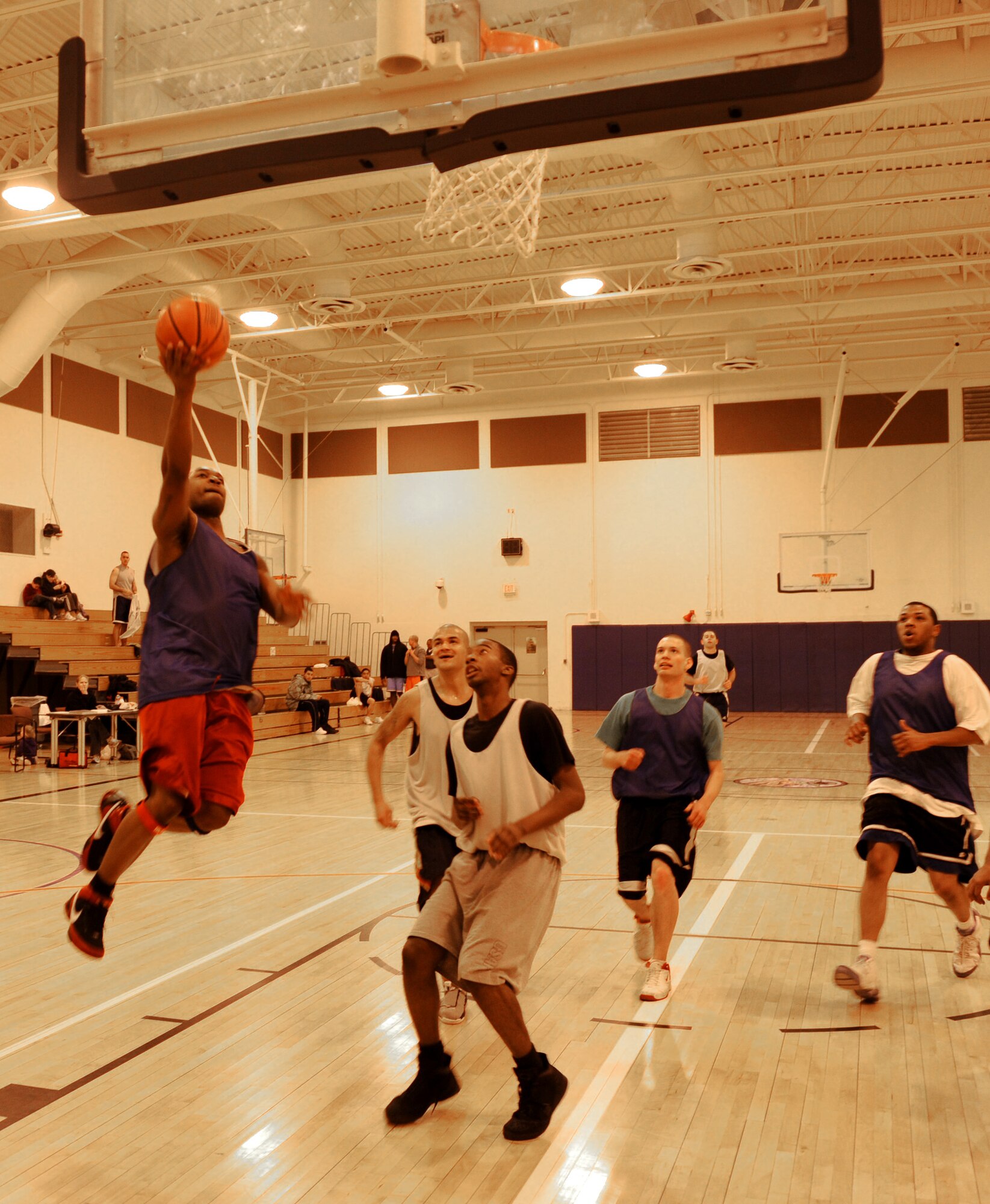 MOUNTAIN HOME AIR FORCE BASE, Idaho -- Brandon Armstrong, 366th Aircraft Maintenance Squadron and Fighter Wing staff combined team, takes a shot during the Jan. 14 intramural basketball game between 366th AMXS/FWS and 366th Medical Group. The 366th MDG was forced to forfeit the game due to a lack of players, giving the 366th AMXS/FWS team the win. Games are played Monday through Thursday at 5, 6 and 7 p.m. with the last game played March 4. (U.S. Air Force photo/Airman 1st Class Debbie Lockhart)