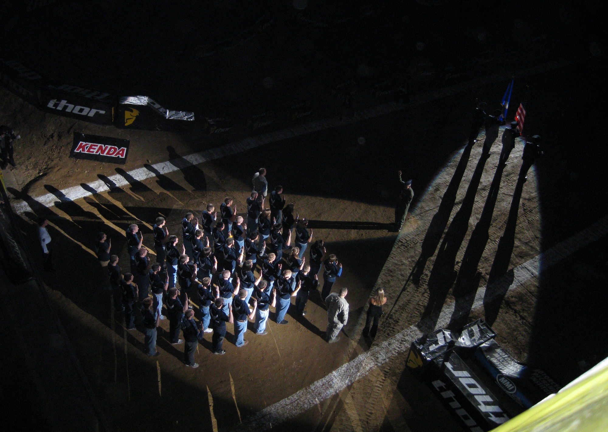 Members of the Wright-Patterson Air Force Base Honor Guard present the colors as  new recruits to the Air Force are administered the oath of enlistment Jan. 17 at an Arenacross 2009 series racing event held at the Ervin J. Nutter Center on the Wright State University Campus.  (U.S. Air Force photo/Tech. Sgt. Libby Stevenson) 