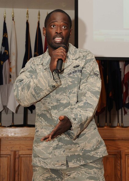 DYESS AIR FORCE BASE, Texas -- Airman 1st Class Dowayne Colquitt, from the 7th Communications Squadron, raps his poetry during the Dr. Martin Luther King, Jr. luncheon here, Jan. 16. The event was held to honor the legacy of Dr. King and his dream. (U.S. Air Force photo by Airman 1st Class Stephen Reyes)