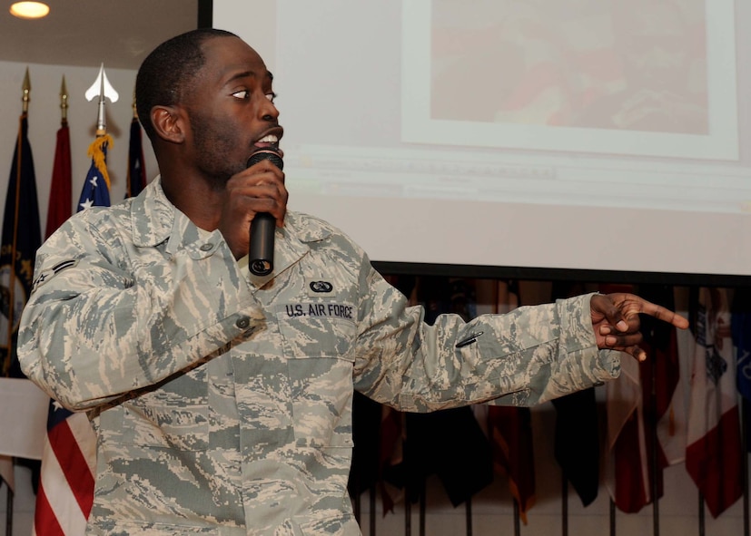 DYESS AIR FORCE BASE, Texas -- Airman 1st Class Dowayne Colquitt, from the 7th Communications Squadron, raps his poetry during the Dr. Martin Luther King, Jr. luncheon here, Jan. 16. The event was held to honor the legacy of Dr. King and his dream. (U.S. Air Force photo by Airman 1st Class Stephen Reyes)