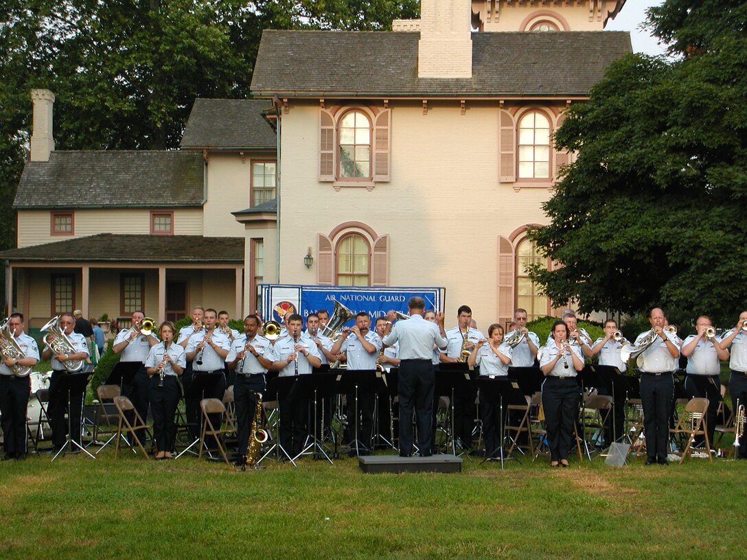 Members of the ANG Band of the Mid-Atlantic perform in Seaford, DE during the 2005 concert tour as part of the Concert Band.  (U.S. Air Force photo by TSgt Larry Kohler)