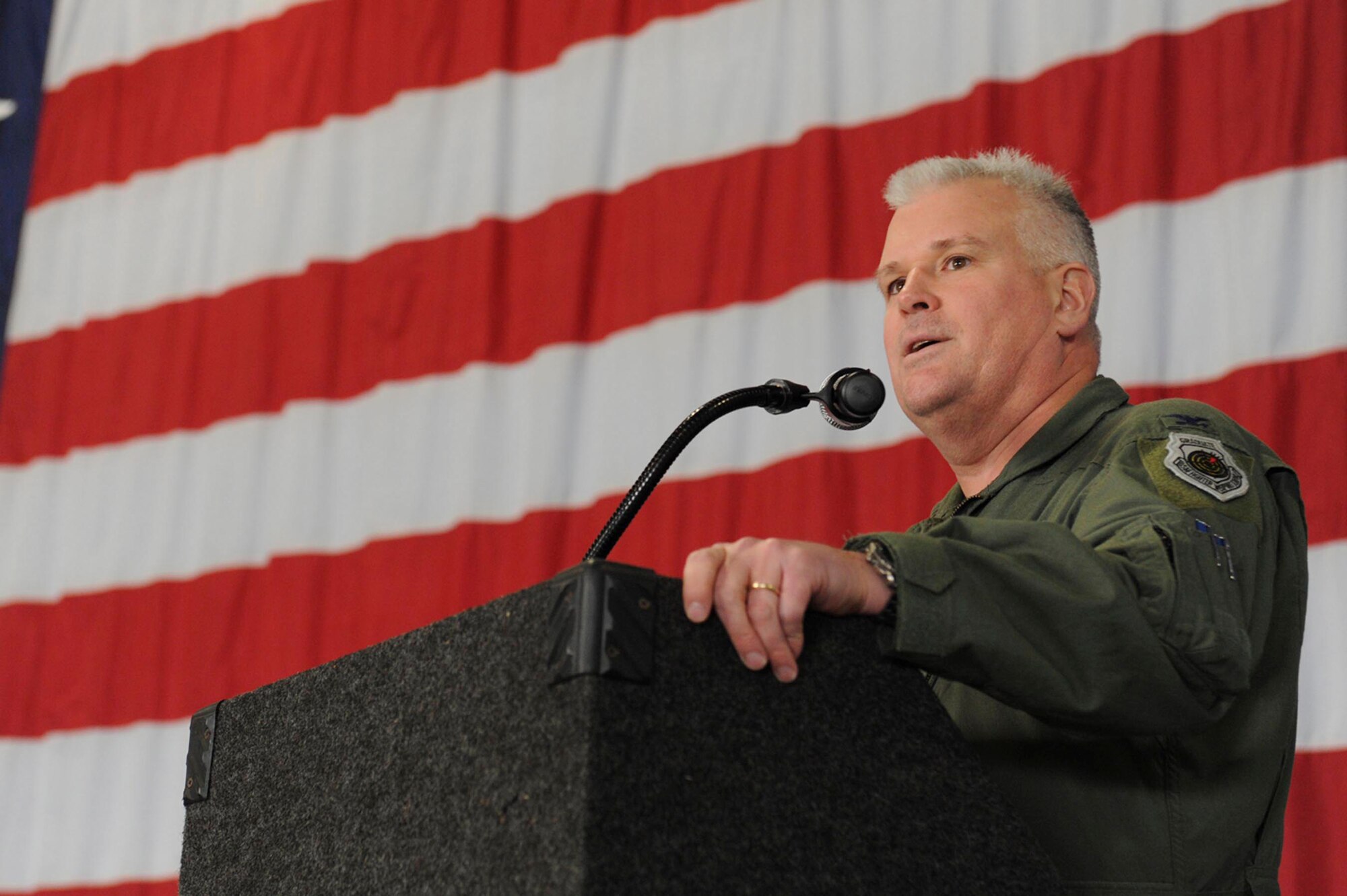 SHAW AIR FORCE BASE, S.C. -- Colonel Dean Anderson, 20th Fighter Wing vice commander, speaks to Airmen during the 20th FW Quarterly Awards Ceremony Jan. 15 in Hangar 1200.