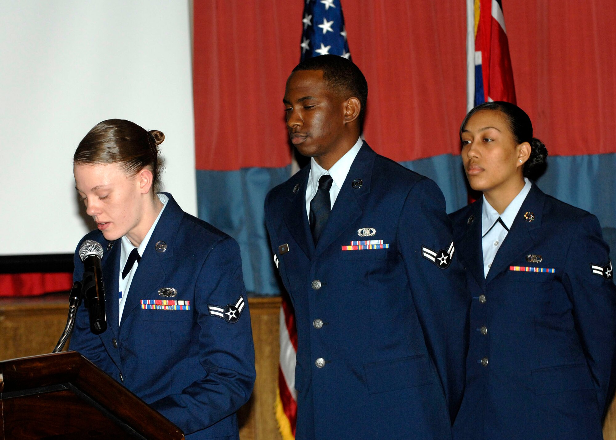Airmen 1st Class Leslie Anderson, Caprice Hines and Jessica Wainwright read excerpts from Dr. King’s “I have a Dream” speech during a luncheon in his honor at RAF Mildenhall Thursday. Col. Sharon Holmes, 422nd Air Base Group commander at RAF Croughton, was the guest speaker for the event where more than 200 people were in attendance. (U.S. Air Force Photo by Master Sgt. Charles Tubbs)