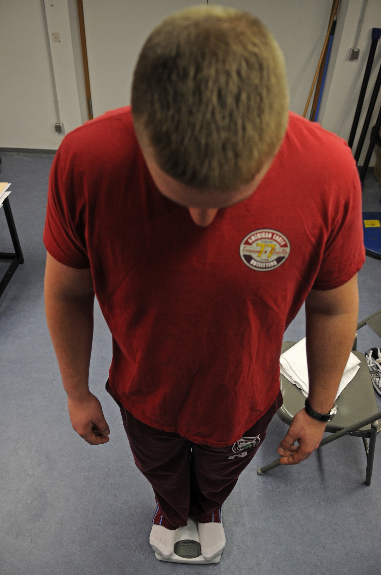 Airman 1st Class Scott Saldukas, 435th Air Base Wing Public Affairs journalist, weighs-in Jan. 17, 2009, for the Biggest Loser Contest held by the 435th Services Squadron at Ramstein Air Base. (U.S. Air Force photo by Airman 1st Class Grovert Fuentes-Contreras)