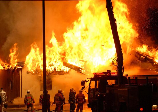 YOKOTA AIR BASE, Japan -- The Defense Finance and Accounting Service Japan
building here, caught fire at about 6:30 p.m. Jan. 20. Firefighters from the
374th Civil Engineer Squadron and the Tokyo Metropolitan Fire Department
worked together to contain the fire. (U.S. Air Force photo/ Airman Sean
Martin)
