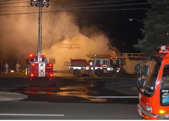YOKOTA AIR BASE, Japan -- The Defense Finance and Accounting Service Japan
building here, caught fire at about 6:30 p.m. Jan. 20. Firefighters from the
374th Civil Engineer Squadron and the Tokyo Metropolitan Fire Department
worked together to contain the fire. (U.S. Air Force photo/ Airman Sean
Martin)