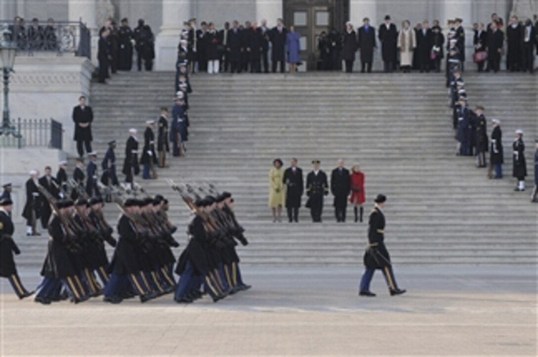 A contingent of the U.S. Army Old Guard passes in review at the Capitol as part of the military escort to the executive mansion on Jan. 20, 2009.  The Armed Forces Inaugural Committee carries on a tradition that dates back more than 200 years of honoring the new commander-in-chief and recognizing civilian control of the military.  The Armed Forces Inaugural Committee is a joint-service organization responsible for providing military ceremonial support to the 56th Presidential Inauguration.  