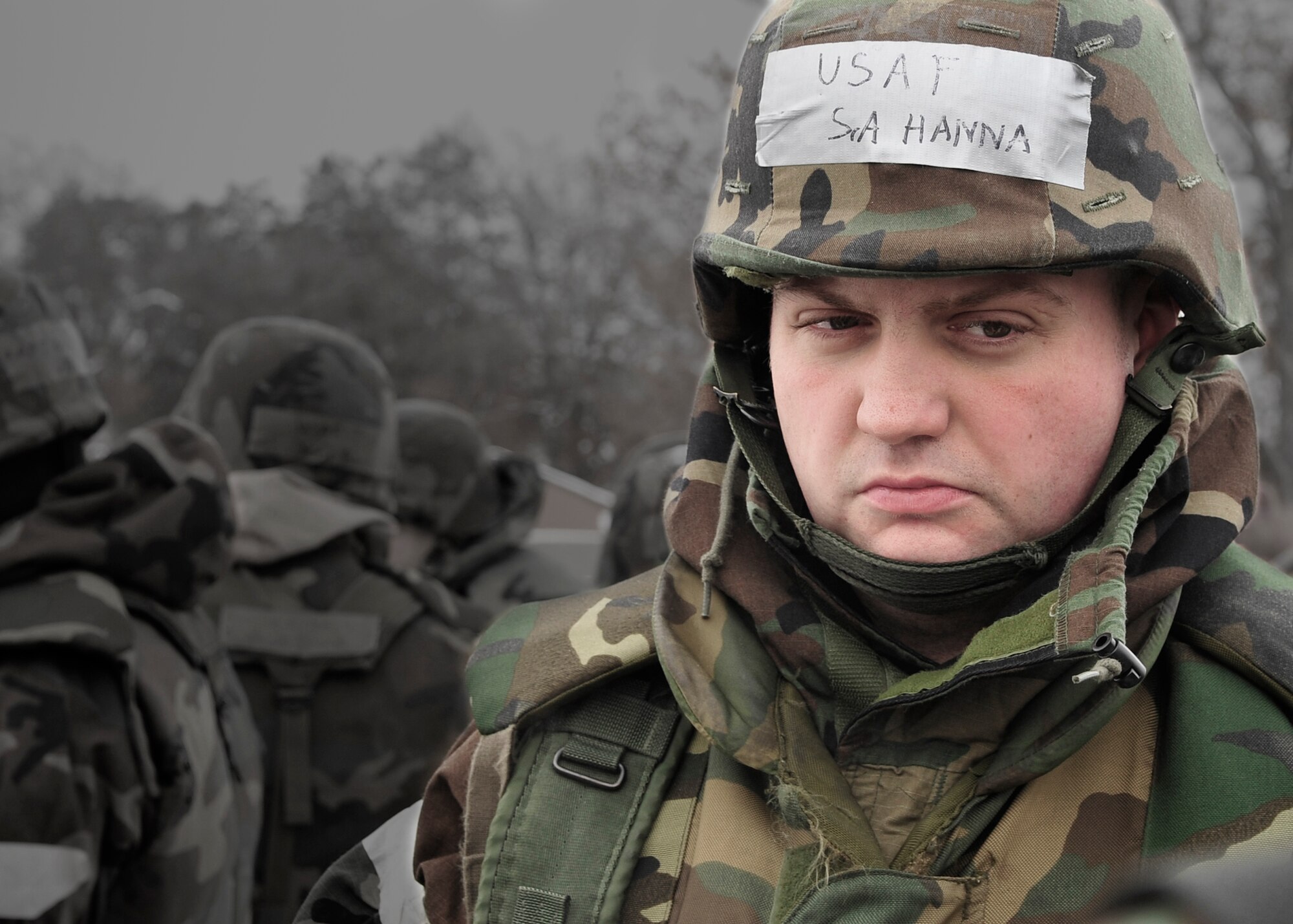 ALPENA, Mich. – Senior Airman John Hanna, 92nd Civil Engineer Squadron, contemplates his next move after hearing news of an ‘inject’ during an exercise in Alpena, Mich., Jan 13. During the exercise Airmen practiced concepts such as Self Aid Buddy Care, dawning of mission oriented protective posture equipment and proper protective procedures during a base attack. (U.S. Air Force photo illustration / Senior Airman Joshua Chapman)

